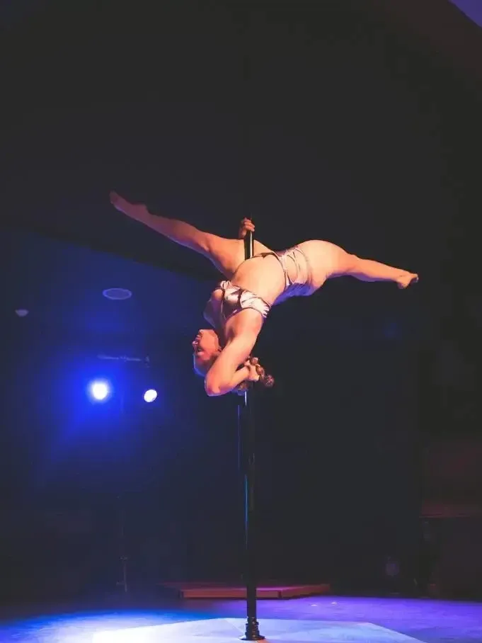 Person holding a pole